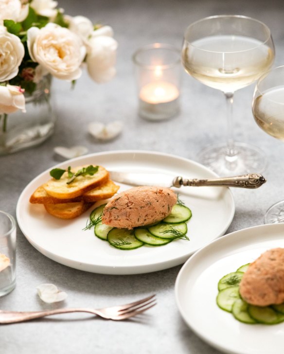 A quenelle of trout rillettes with cucumber and crostini.