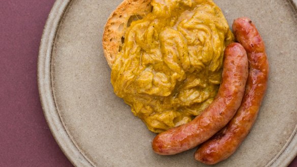 Curried scrambled eggs with LP's pork sausages. 