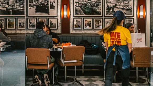 Art deco booths and vintage styling at Harvey's Hot Sandwiches.