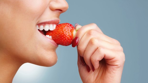 Slowly sharing a strawberry or a cherry can lead to deliciously passionate kisses.