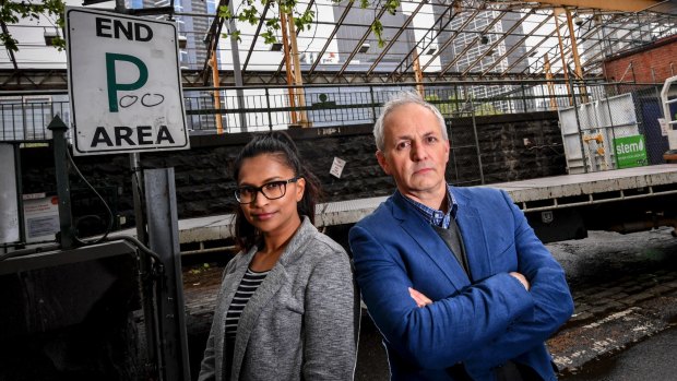 Tom Keel and Rachna Prasad want unused train carriages at Flinders Street Station to be turned into shelter for homeless people.