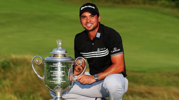 Jason Day poses after winning the 2015 PGA with a score of 20 under par.