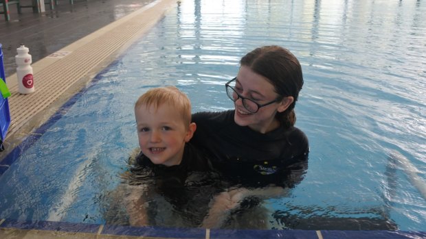 Patrick Thomas, 4, of Monash with swimming instructor Victoria Flood at the Southern Cross Club's new gym. 