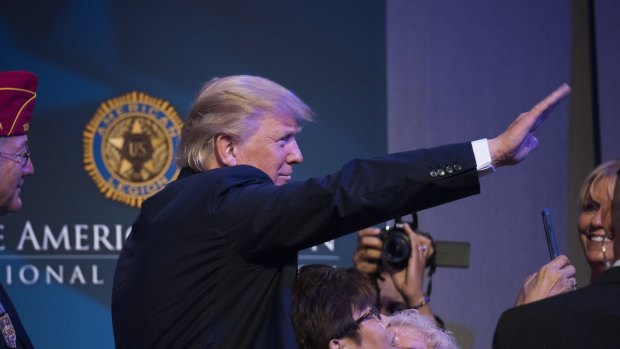 Donald Trump, 2016 Republican presidential nominee, greets members of The American Legion after speaking at the National Convention in Cincinnati, Ohio.