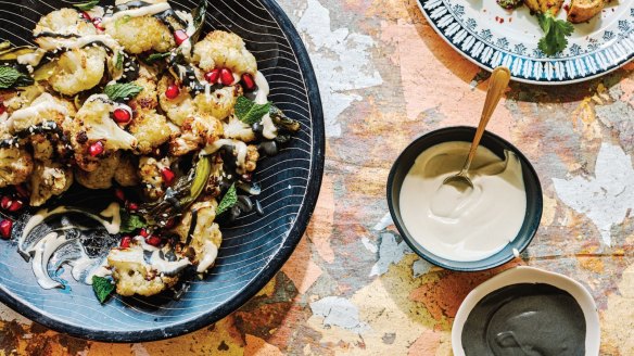 Roasted cauliflower with black and white tahini.