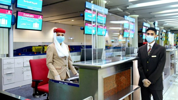 Check-in desks at Dubai Airport now feature protective screens.