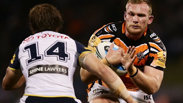 Matthew Lodge in action for Wests Tigers against the Cowboys this year.