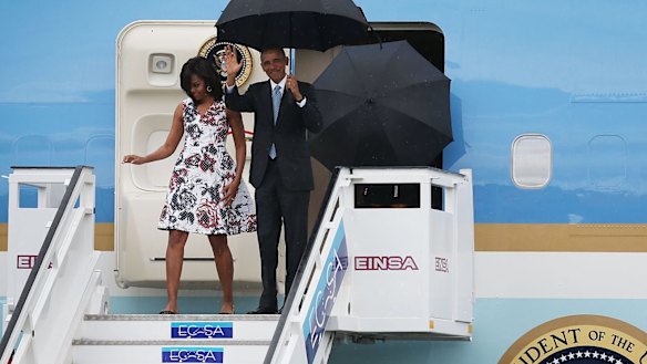US President Barack Obama and Michelle Obama arrive at Jose Marti International Airport in Havana, Cuba.  