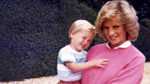 Princess Diana holding Prince William while pregnant with Harry, in a previously unseen photo which  features in the new documentary.