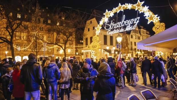 A busy Christmas market in the city of Strasbourg, France.