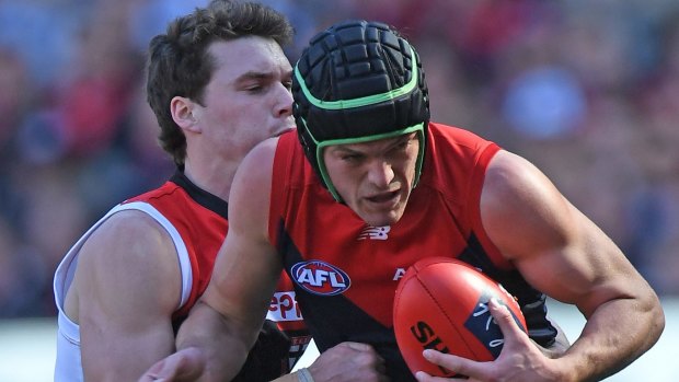 Playing it safe: Melbourne's Angus Brayshaw chose to wear a helmet for his AFL return.