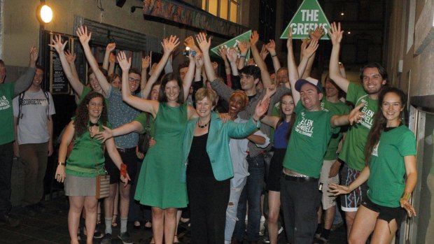 Ellen Sandell celebrates with supporters after winning Melbourne in 2014.