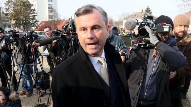 Norbert Hofer of Austria's far-right Freedom Party speaks to press outside a polling booth on Sunday.