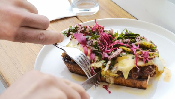 Eggplant, Aleppo pepper and Turkish cheese toastie with fried eggs, fermented chilli and sumac onions at Babajan (lamb shoulder optional).