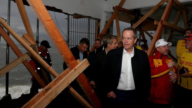 Opposition Leader Bill Shorten tours the storm affected Coogee Surf Life Saving Club in Sydney on Tuesday.