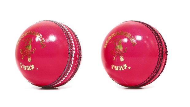 Pink balls old and new: New (right) has black stitching instead of green and white (left)
