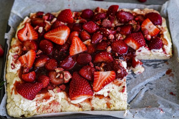 Lemonade scone slab with strawberry jam, cream and fresh strawberries.