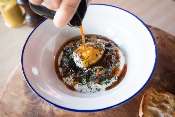 Cilbir - poached egg, yoghurt and wilted spinach with spiced burnt butter poured at the table.