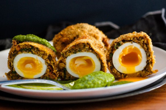 Vegetarian scotch eggs with vibrant green goddess dressing.