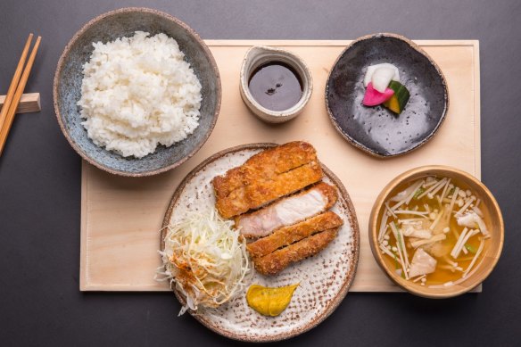 Pork tonkatsu lunch set with hot mustard, rice, miso and vibrant house pickles.