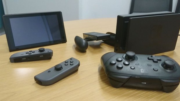 When you buy a Switch you get the console, two Joy-Con, a grip, and the dock. The Pro Controller (front right) is sold separately.