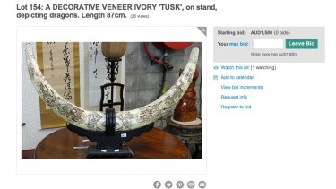 Decorative ivory tusks on an online auction catalogue.