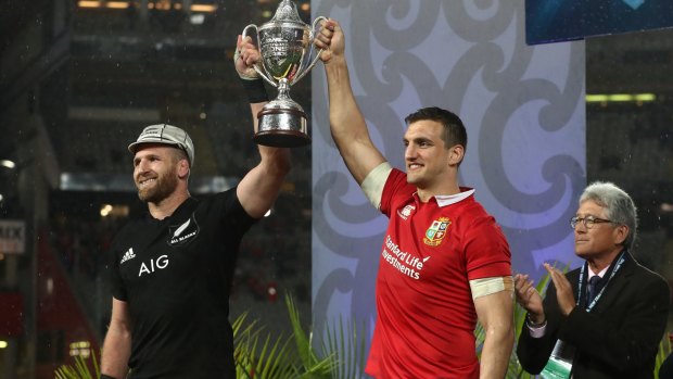 Sharing the spoils: Opposing captains Kieran Read and Sam Warburton lift the trophy following a drawn series.