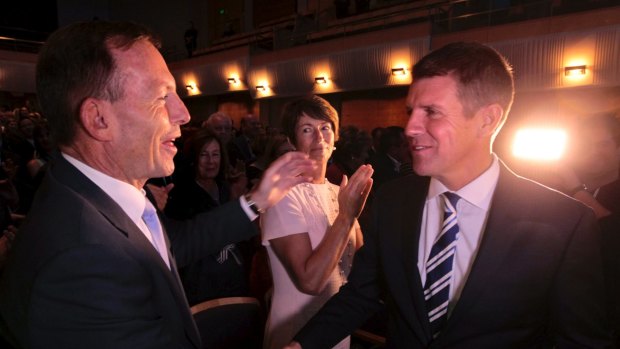 Opposing propositions: Tony Abbott the polariser and Mike Baird the likeable.