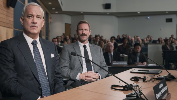 Tom Hanks, left, and Aaron Eckhart in <i>Sully</i>.