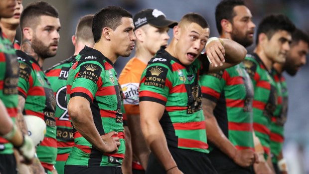 Season over: Rabbitohs players looks on after another Canberra try.