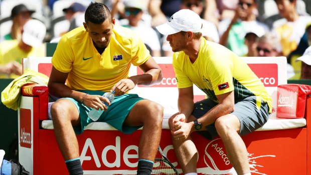 Friendly advice: Lleyton Hewitt speaks to Nick Kyrgios during the Davis Cup tie at Sydney Olympic Park Tennis Centre.