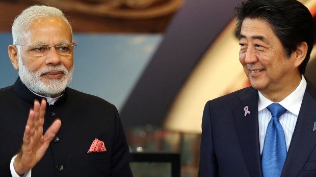 Narendra Modi, India's prime minister, left, and Shinzo Abe, Japan's prime minister in Japan