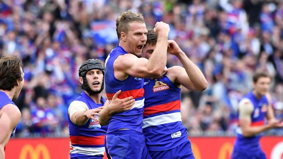 The Bulldogs celebrate a late Jake Stringer goal.