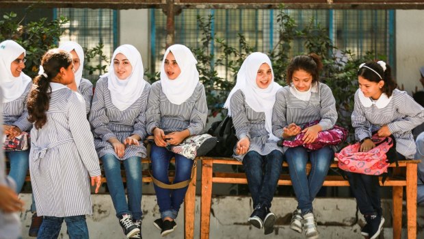 Students attend an opening ceremony for the 2015-2016 school year at the UNRWA primary school in Gaza City on August 31.