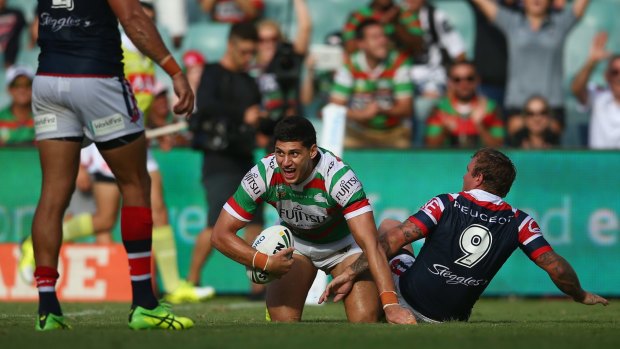 Over he goes: Kyle Turner celebrates scoring a try during the round one NRL match between the Sydney Roosters and the South Sydney Rabbitohs at Allianz Stadium.
