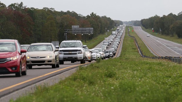 Bumper-to-bumper traffic heads out on the SR528 beach line as motorists away from Brevard County, Florida on Thursday.