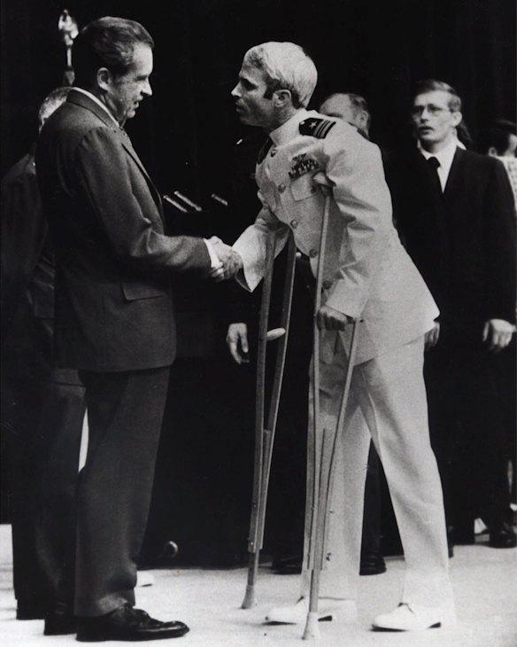In this 1973 file photo John McCain is greeted by US president Richard Nixon after more than five years in a Vietnamese prisoner of war camp.