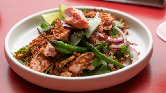 Smoked trout nam khao tod at Lucy Liu in Melbourne, which offers a pre-theatre menu.