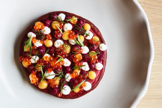 Beetroot pancake with trout roe and lemon curd.