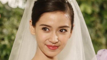 Chinese actress Angelababy, pictured at her wedding earlier in October, endured some unusually invasive public scrutiny this week.  