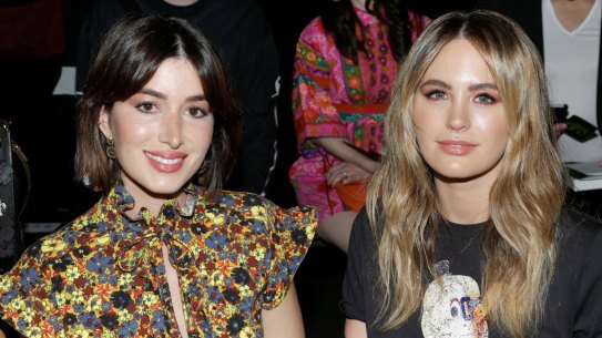 Jesinta Franklin (R) and fashion blogger Carmen Hamilton at the Coach spring 2018 show during New York Fashion Week on September 12, 2017.
