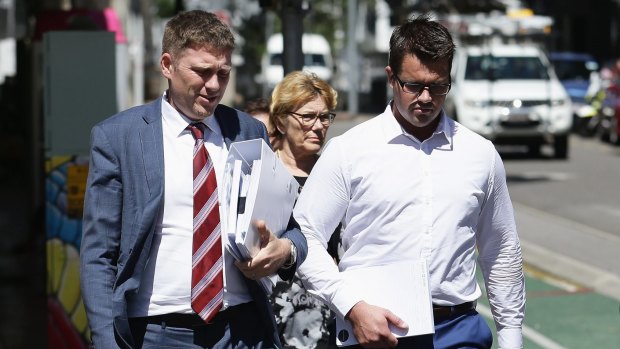 Gable Tostee, right, arrives at the court with his lawyer Nick Dore.