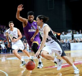 Purple patch: Chris Goulding gets around Dion Prewster during Melbourne's win over Sydney.