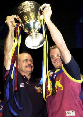 Glory days: Leigh Matthews and Michael Voss when they were coach and captain of the Lions' 2001 Premiership side.