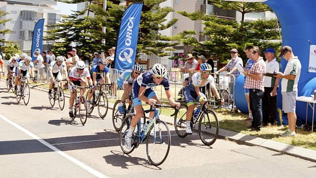 Caleb Ewan (right), finishes first in the Criterium at last year's event.

