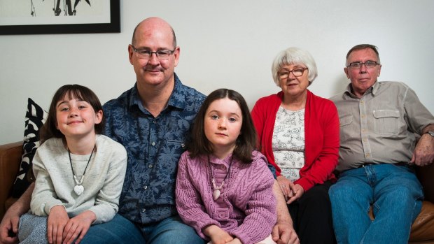 Melanie Swan's husband Scott Chamberlain and their daughters, Emma, 8, and Sophie 6, and her parents Coral and David Swan.