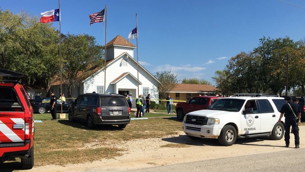 Emergency personnel respond to a fatal shooting at a Baptist church in Sutherland Springs, Texas.