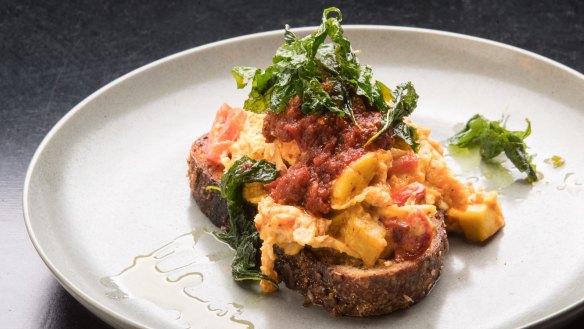 Chilli eggs folded with plantain, topped with amaranth leaf and jazzed up with Ghanaian-style hot pepper sauce.