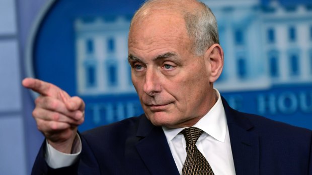 White House Chief of Staff John Kelly calls on a reporter during the daily briefing at the White House in Washington.