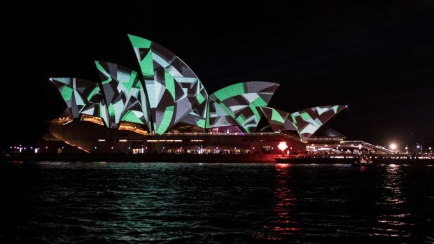 The sails take on a different hue during Vivid opening night.